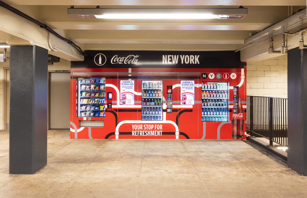 Coca-Cola-branded automated retail wall with snack and beverage machines at the Second Avenue-East Houston subway station